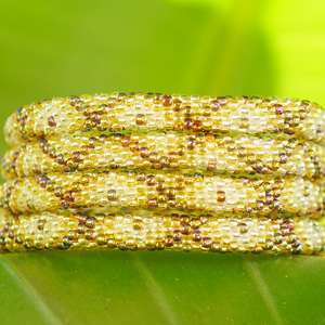 Handmade glass bead bracelet from Nepal, featuring a roll design. Also known as a beaded bracelet, seed bead bracelet, beach glass bracelet, or sea glass bracelet.