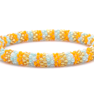 Handmade glass bead bracelet from Nepal, featuring a roll design. Also known as a beaded bracelet, seed bead bracelet, beach glass bracelet, or sea glass bracelet.
