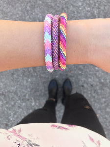 Handmade glass bead bracelet from Nepal, featuring a roll design. Also known as a beaded bracelet, seed bead bracelet, beach glass bracelet, or sea glass bracelet.