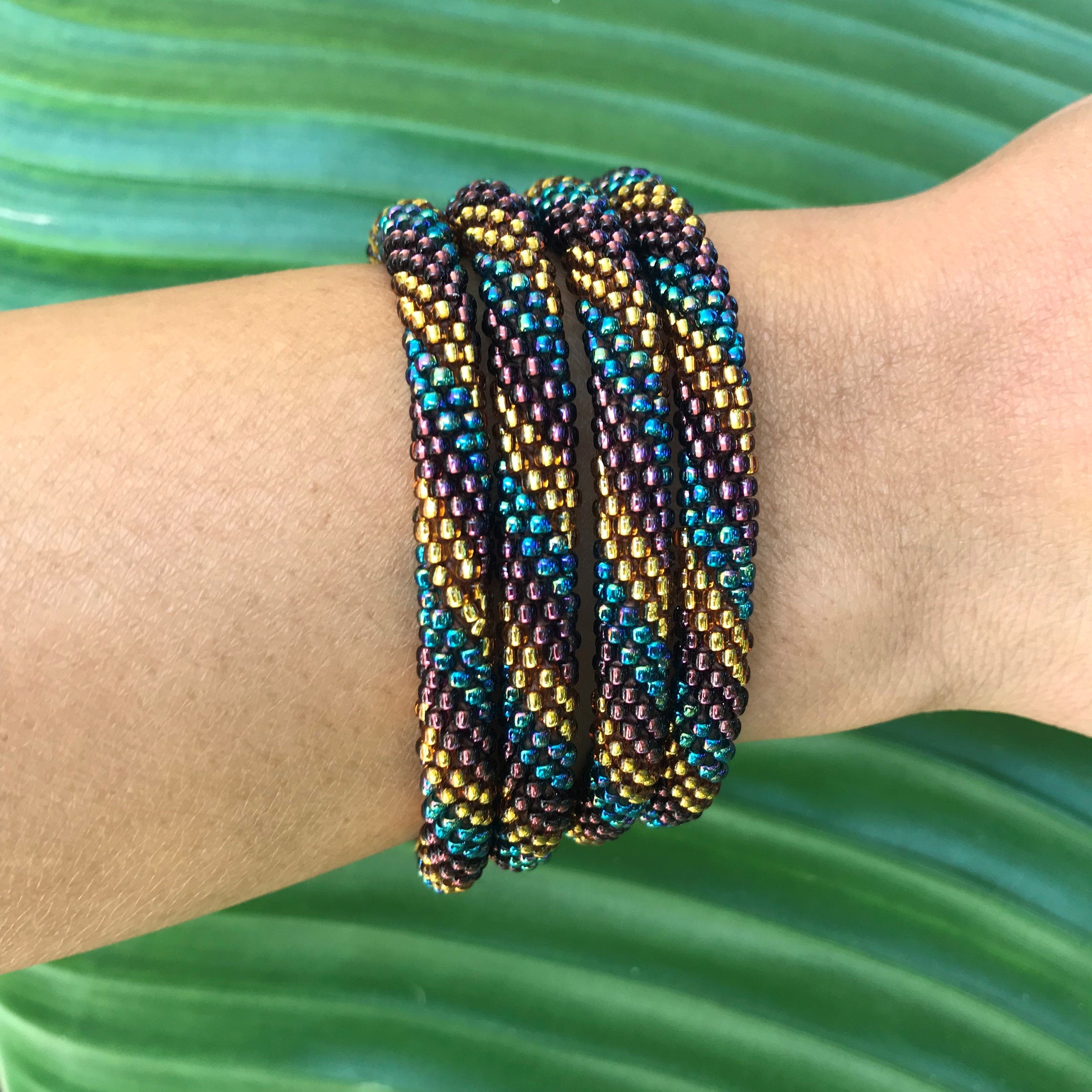 Handmade glass bead bracelet from Nepal, featuring a roll design. Also known as a beaded bracelet, seed bead bracelet, beach glass bracelet, or sea glass bracelet