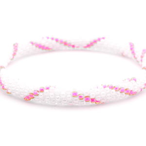 Handmade glass bead bracelet from Nepal, featuring a roll design. Also known as a beaded bracelet, seed bead bracelet, beach glass bracelet, or sea glass bracelet