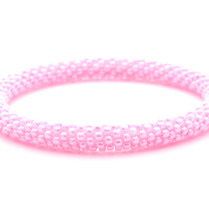 Handmade glass bead bracelet from Nepal, featuring a roll design. Also known as a beaded bracelet, seed bead bracelet, beach glass bracelet, or sea glass bracelet