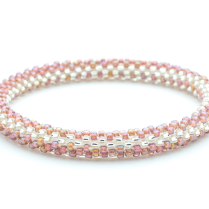 Handmade glass bead bracelet from Nepal, featuring a roll design. Also known as a beaded bracelet, seed bead bracelet, beach glass bracelet, or sea glass bracelet