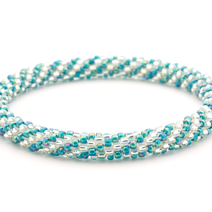 Handmade glass bead bracelet from Nepal, featuring a roll design. Also known as a beaded bracelet, seed bead bracelet, beach glass bracelet, or sea glass bracelet