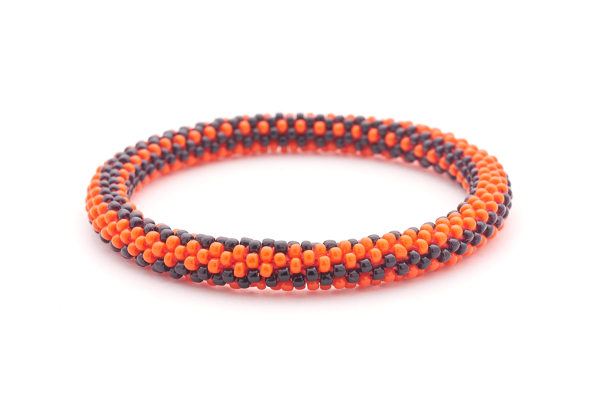 Handmade glass bead bracelet from Nepal, featuring a roll design. Also known as a beaded bracelet, seed bead bracelet, beach glass bracelet, or sea glass bracelet