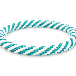 Handmade glass bead bracelet from Nepal, featuring a roll design. Also known as a beaded bracelet, seed bead bracelet, beach glass bracelet, or sea glass bracelet