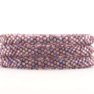 Handmade glass bead bracelet from Nepal, featuring a roll design. Also known as a beaded bracelet, seed bead bracelet, beach glass bracelet, or sea glass bracelet