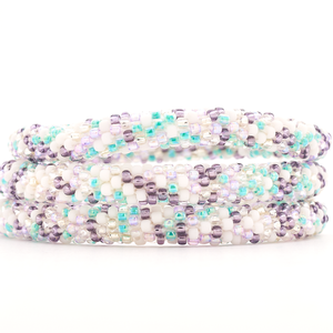 Handmade glass bead bracelet from Nepal, featuring a roll design. Also known as a beaded bracelet, seed bead bracelet, beach glass bracelet, or sea glass bracelet
