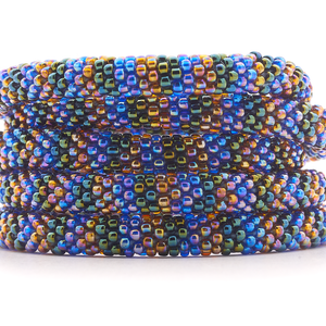 Handmade glass bead bracelet from Nepal, featuring a roll design. Also known as a beaded bracelet, seed bead bracelet, beach glass bracelet, or sea glass bracelet