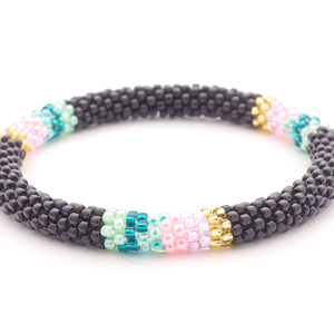 Handmade glass bead bracelet from Nepal, featuring a roll design. Also known as a beaded bracelet, seed bead bracelet, beach glass bracelet, or sea glass bracelet