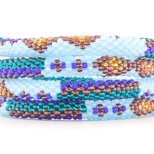 Handmade glass bead bracelet from Nepal, featuring a roll design. Also known as a beaded bracelet, seed bead bracelet, beach glass bracelet, or sea glass bracelet