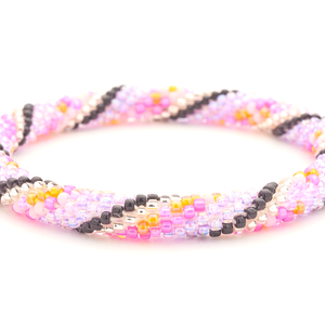 Handmade glass bead bracelet from Nepal, featuring a roll design. Also known as a beaded bracelet, seed bead bracelet, beach glass bracelet, or sea glass bracelet
