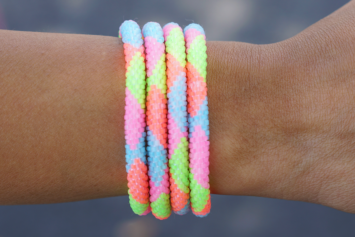 Handmade glass bead bracelet from Nepal, featuring a roll design. Also known as a beaded bracelet, seed bead bracelet, beach glass bracelet, or sea glass bracelet.