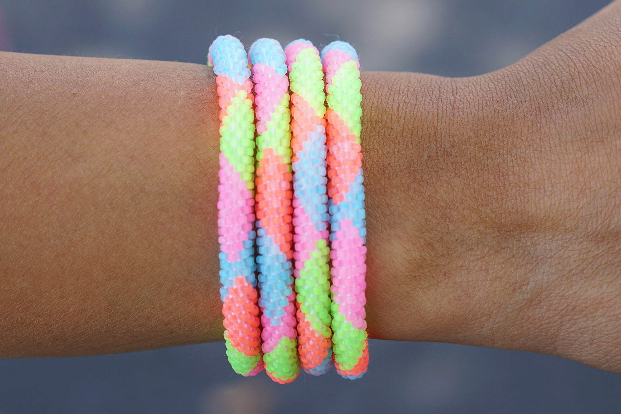 Handmade glass bead bracelet from Nepal, featuring a roll design. Also known as a beaded bracelet, seed bead bracelet, beach glass bracelet, or sea glass bracelet.