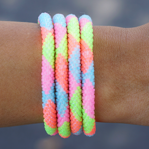 Handmade glass bead bracelet from Nepal, featuring a roll design. Also known as a beaded bracelet, seed bead bracelet, beach glass bracelet, or sea glass bracelet.