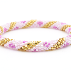 Handmade glass bead bracelet from Nepal, featuring a roll design. Also known as a beaded bracelet, seed bead bracelet, beach glass bracelet, or sea glass bracelet.