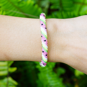 Handmade glass bead bracelet from Nepal, featuring a roll design. Also known as a beaded bracelet, seed bead bracelet, beach glass bracelet, or sea glass bracelet