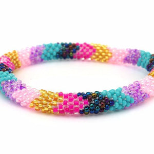 Handmade glass bead bracelet from Nepal, featuring a roll design. Also known as a beaded bracelet, seed bead bracelet, beach glass bracelet, or sea glass bracelet.