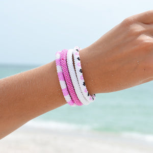 Handmade glass bead bracelet from Nepal, featuring a roll design. Also known as a beaded bracelet, seed bead bracelet, beach glass bracelet, or sea glass bracelet.