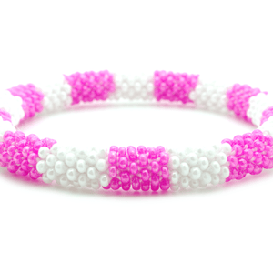 Handmade glass bead bracelet from Nepal, featuring a roll design. Also known as a beaded bracelet, seed bead bracelet, beach glass bracelet, or sea glass bracelet.