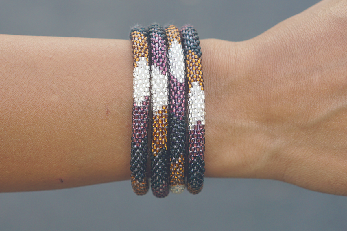Handmade glass bead bracelet from Nepal, featuring a roll design. Also known as a beaded bracelet, seed bead bracelet, beach glass bracelet, or sea glass bracelet.