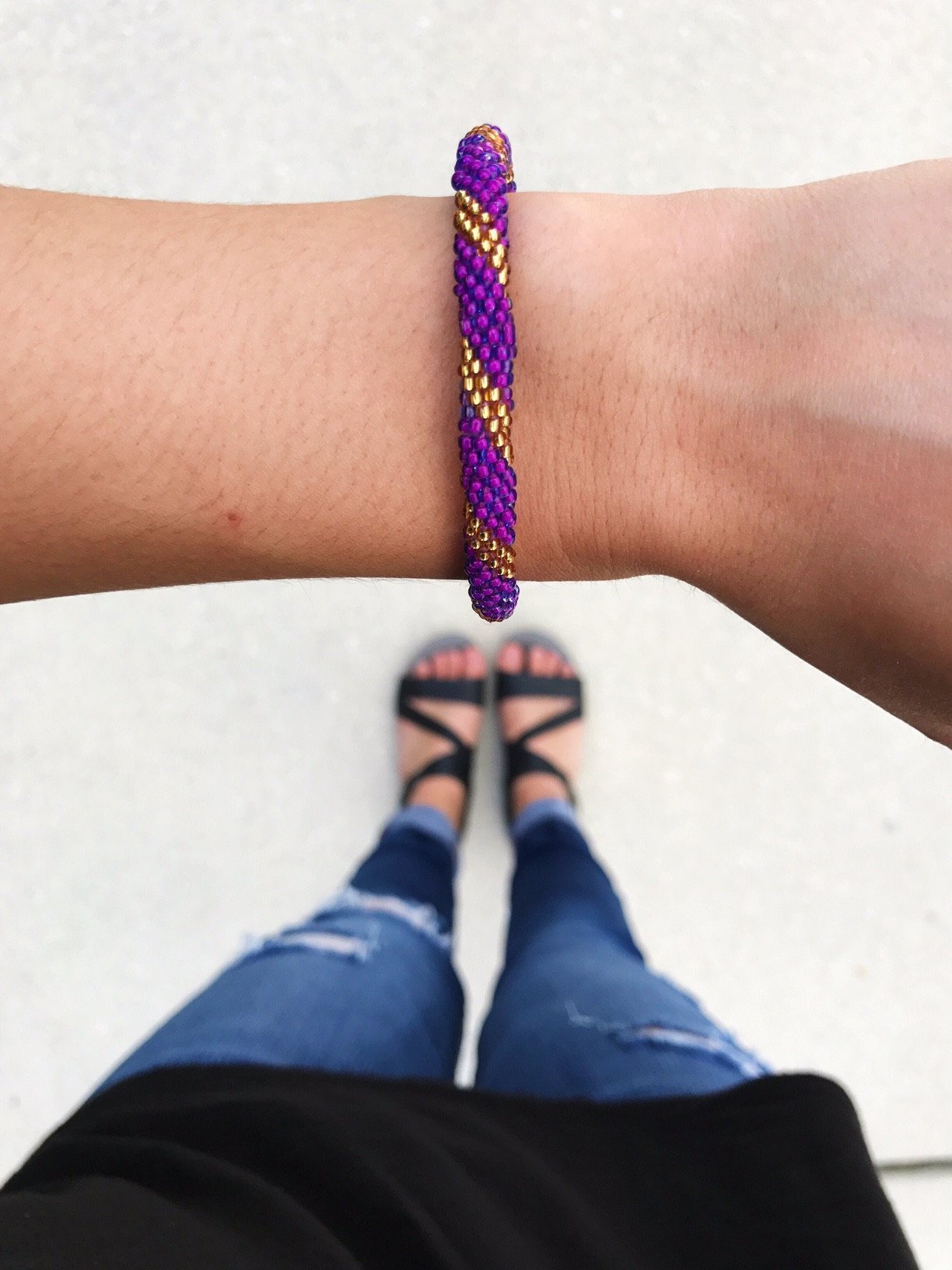 Handmade glass bead bracelet from Nepal, featuring a roll design. Also known as a beaded bracelet, seed bead bracelet, beach glass bracelet, or sea glass bracelet.