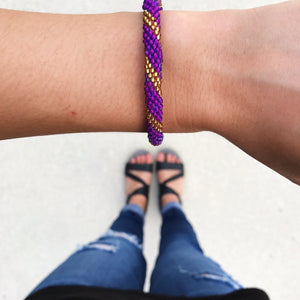 Handmade glass bead bracelet from Nepal, featuring a roll design. Also known as a beaded bracelet, seed bead bracelet, beach glass bracelet, or sea glass bracelet.