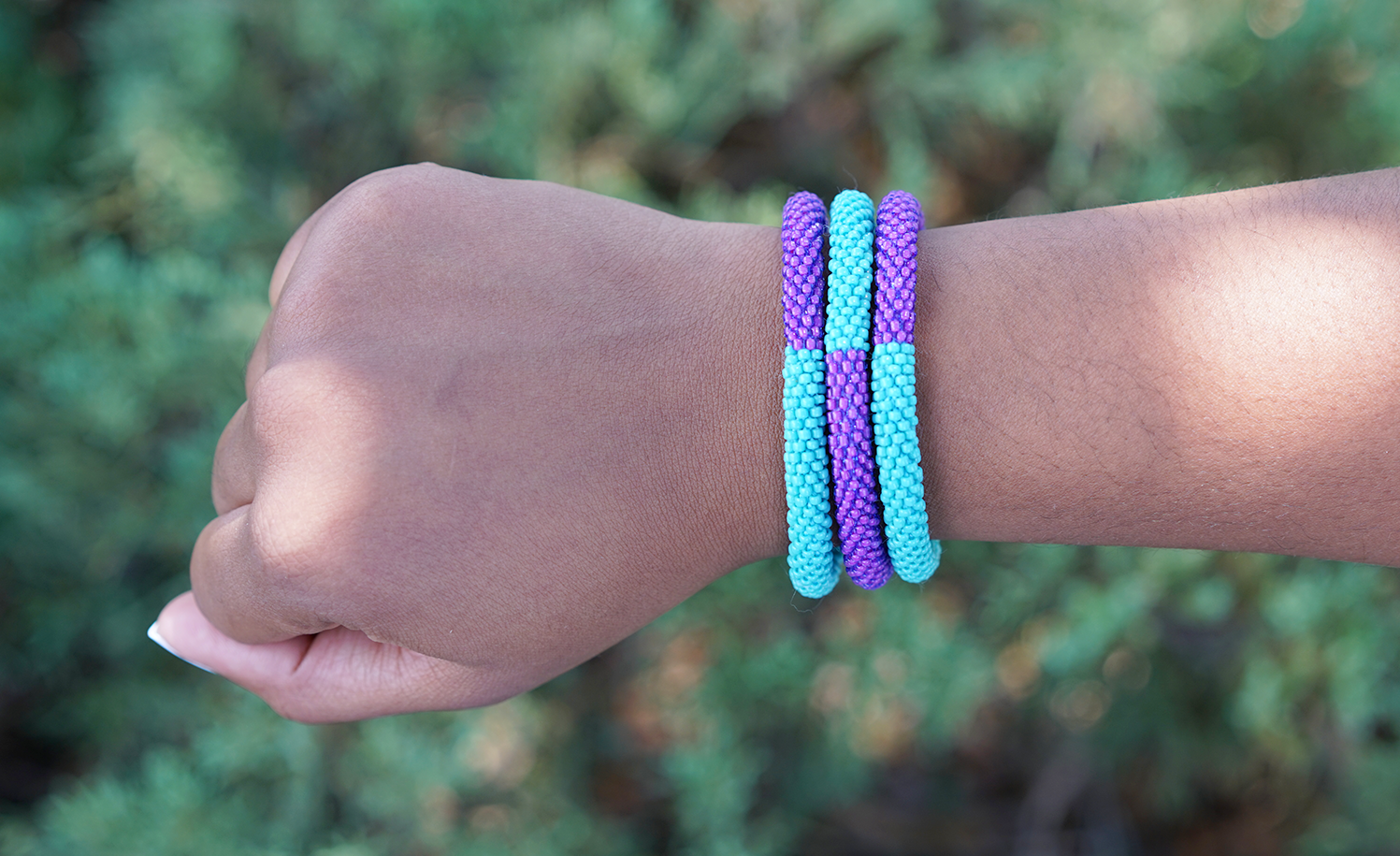 Handmade glass bead bracelet from Nepal, featuring a roll design. Also known as a beaded bracelet, seed bead bracelet, beach glass bracelet, or sea glass bracelet.