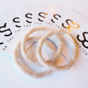 Handmade glass bead bracelet from Nepal, featuring a roll design. Also known as a beaded bracelet, seed bead bracelet, beach glass bracelet, or sea glass bracelet.