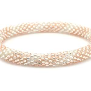 Handmade glass bead bracelet from Nepal, featuring a roll design. Also known as a beaded bracelet, seed bead bracelet, beach glass bracelet, or sea glass bracelet.