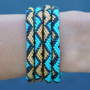 Handmade glass bead bracelet from Nepal, featuring a roll design. Also known as a beaded bracelet, seed bead bracelet, beach glass bracelet, or sea glass bracelet.