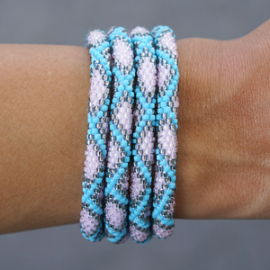 Handmade glass bead bracelet from Nepal, featuring a roll design. Also known as a beaded bracelet, seed bead bracelet, beach glass bracelet, or sea glass bracelet