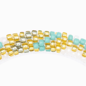 Handmade glass bead bracelet from Nepal, featuring a roll design. Also known as a beaded bracelet, seed bead bracelet, beach glass bracelet, or sea glass bracelet