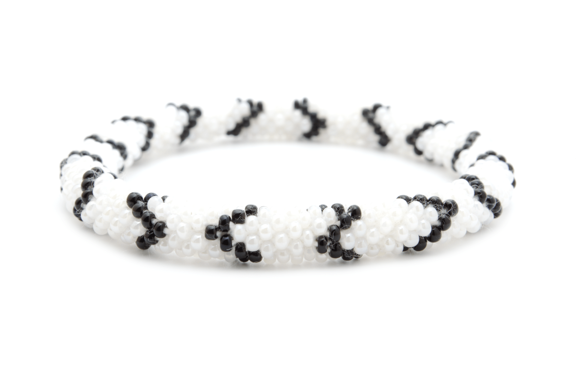 Handmade glass bead bracelet from Nepal, featuring a roll design. Also known as a beaded bracelet, seed bead bracelet, beach glass bracelet, or sea glass bracelet.