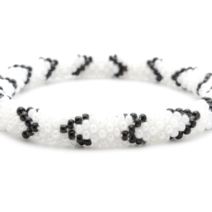 Handmade glass bead bracelet from Nepal, featuring a roll design. Also known as a beaded bracelet, seed bead bracelet, beach glass bracelet, or sea glass bracelet.