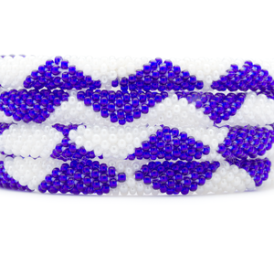 Handmade glass bead bracelet from Nepal, featuring a roll design. Also known as a beaded bracelet, seed bead bracelet, beach glass bracelet, or sea glass bracelet.