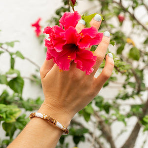 Handmade glass bead bracelet from Nepal, featuring a roll design. Also known as a beaded bracelet, seed bead bracelet, beach glass bracelet, or sea glass bracelet
