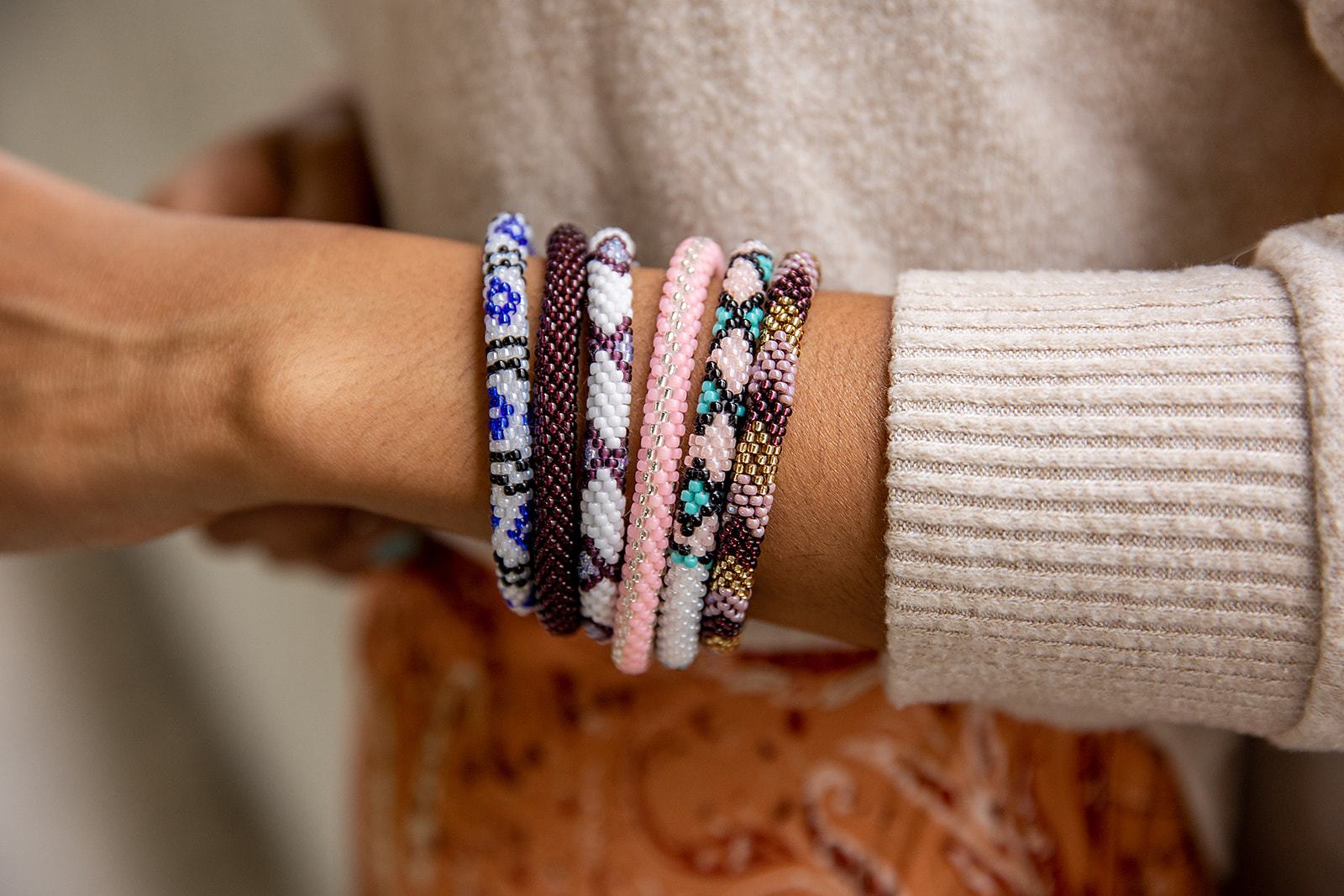 Handmade glass bead bracelet from Nepal, featuring a roll design. Also known as a beaded bracelet, seed bead bracelet, beach glass bracelet, or sea glass bracelet