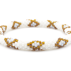 Handmade glass bead bracelet from Nepal, featuring a roll design. Also known as a beaded bracelet, seed bead bracelet, beach glass bracelet, or sea glass bracelet.