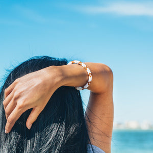Handmade glass bead bracelet from Nepal, featuring a roll design. Also known as a beaded bracelet, seed bead bracelet, beach glass bracelet, or sea glass bracelet.