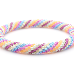Handmade glass bead bracelet from Nepal, featuring a roll design. Also known as a beaded bracelet, seed bead bracelet, beach glass bracelet, or sea glass bracelet.