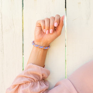 Handmade glass bead bracelet from Nepal, featuring a roll design. Also known as a beaded bracelet, seed bead bracelet, beach glass bracelet, or sea glass bracelet.