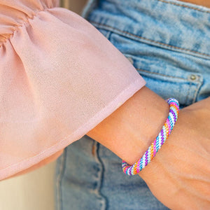 Handmade glass bead bracelet from Nepal, featuring a roll design. Also known as a beaded bracelet, seed bead bracelet, beach glass bracelet, or sea glass bracelet.