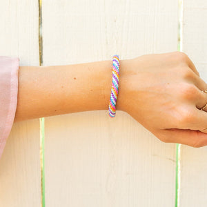 Handmade glass bead bracelet from Nepal, featuring a roll design. Also known as a beaded bracelet, seed bead bracelet, beach glass bracelet, or sea glass bracelet.