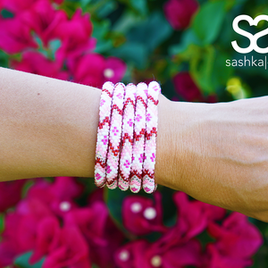 Handmade glass bead bracelet from Nepal, featuring a roll design. Also known as a beaded bracelet, seed bead bracelet, beach glass bracelet, or sea glass bracelet