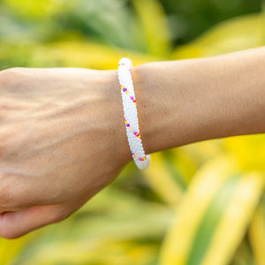 Handmade glass bead bracelet from Nepal, featuring a roll design. Also known as a beaded bracelet, seed bead bracelet, beach glass bracelet, or sea glass bracelet.