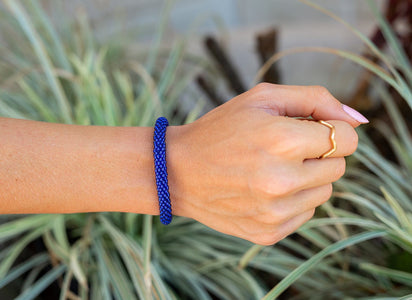 Handmade glass bead bracelet from Nepal, featuring a roll design. Also known as a beaded bracelet, seed bead bracelet, beach glass bracelet, or sea glass bracelet