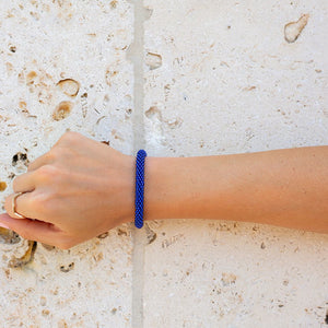 Handmade glass bead deep blue bracelet from Nepal, featuring a roll design. Also known as a beaded bracelet, seed bead bracelet, beach glass bracelet, or sea glass bracelet