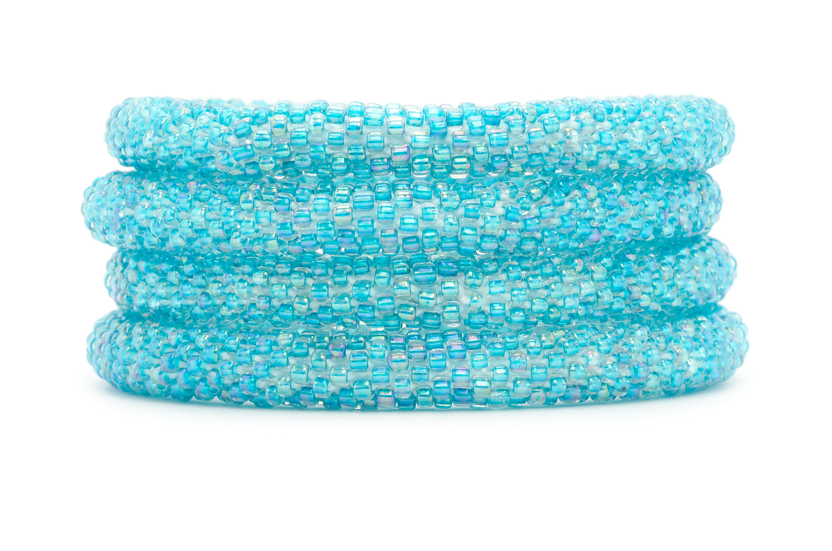 Handmade glass bead iridescent aqua teal bracelet from Nepal, featuring a roll design. Also known as a beaded bracelet, seed bead bracelet, beach glass bracelet, or sea glass bracelet