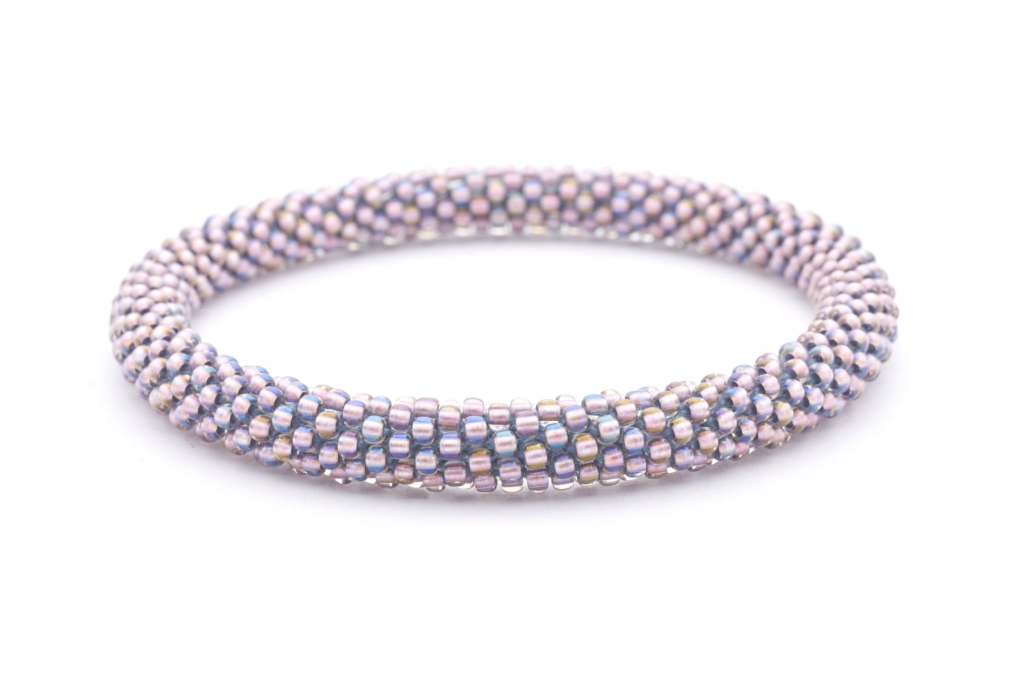Handmade Beaded friendship bracelet with iridescent purple glass beads. Crafted by artisans in Nepal for Sashka Co. 
